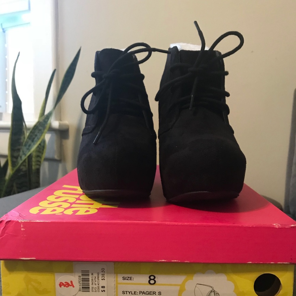 Black wedge booties